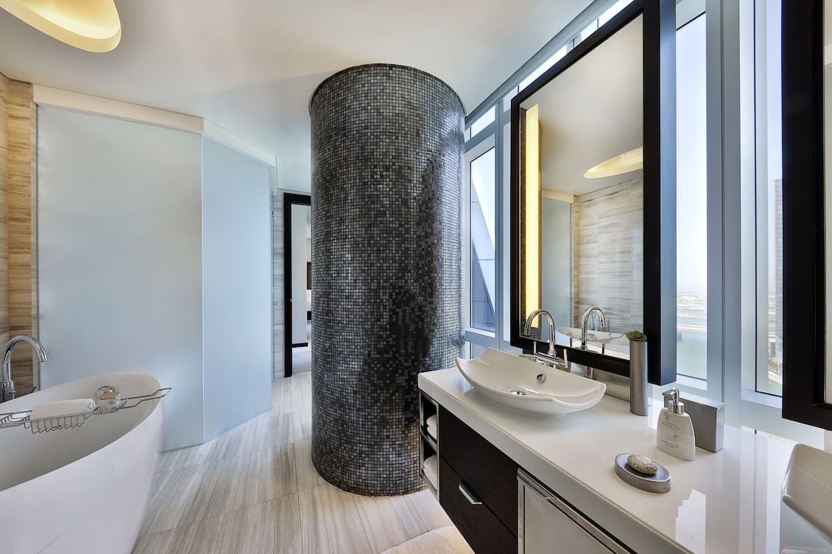 premier suite (skyline view) | bathroom | separate bathtub and shower, free toiletries, hair dryer, bathrobes