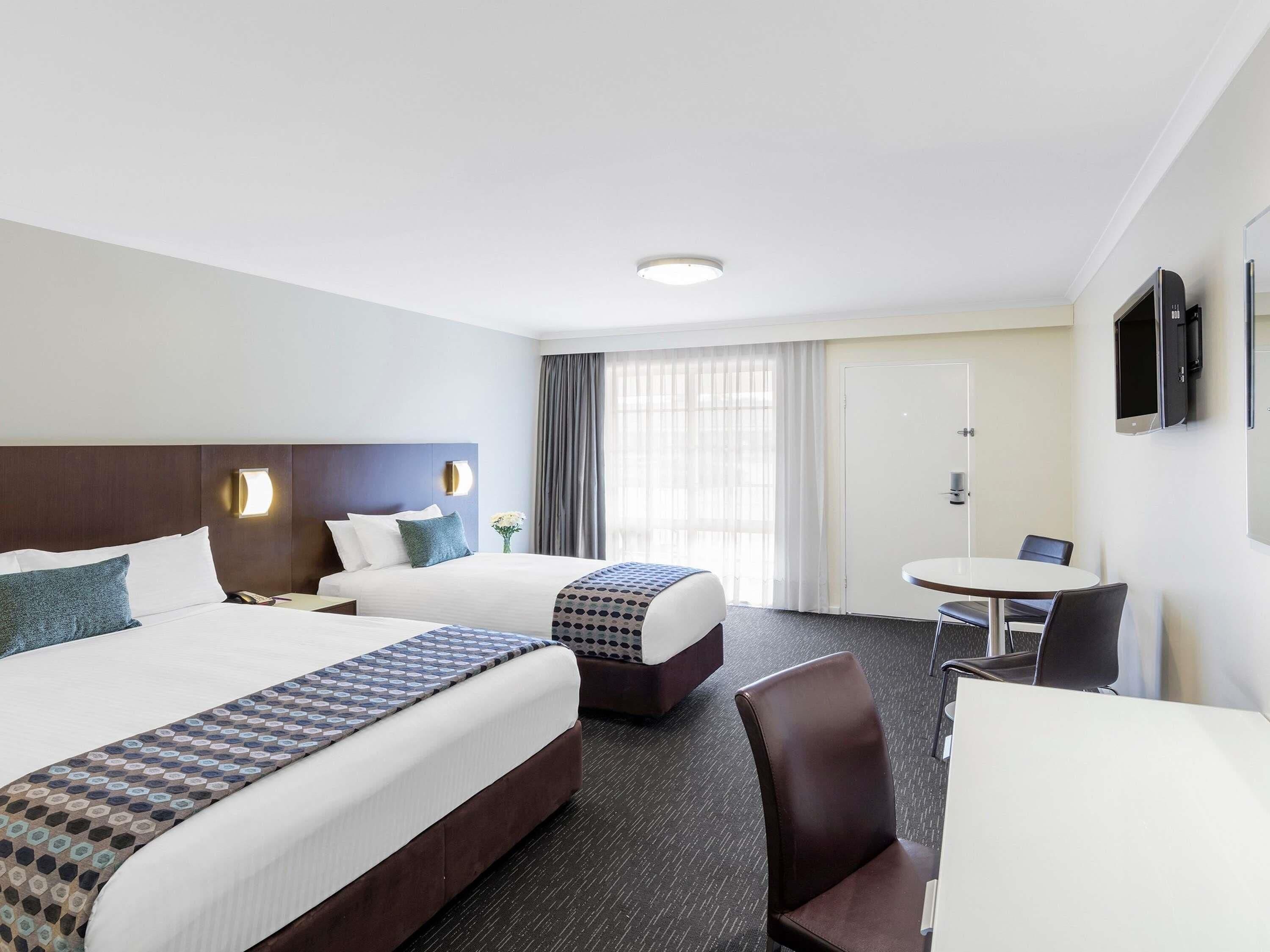 Superior Room, Multiple Beds | Pillow-top beds, minibar, in-room safe, desk