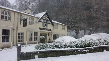 A traditional building with a sign reading "CUCKOO BROWN INN".