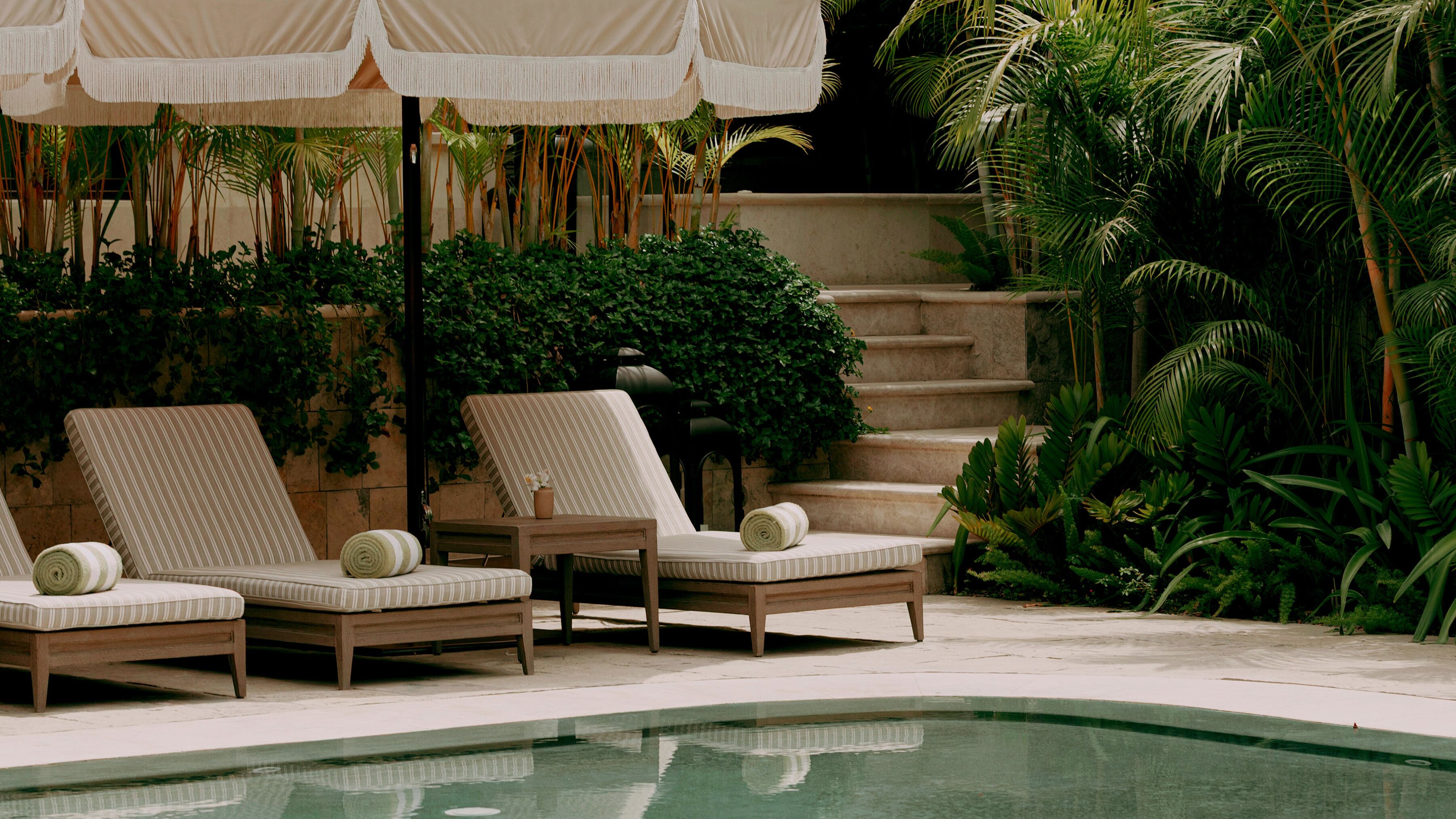 Outdoor pool, pool umbrellas, sun loungers