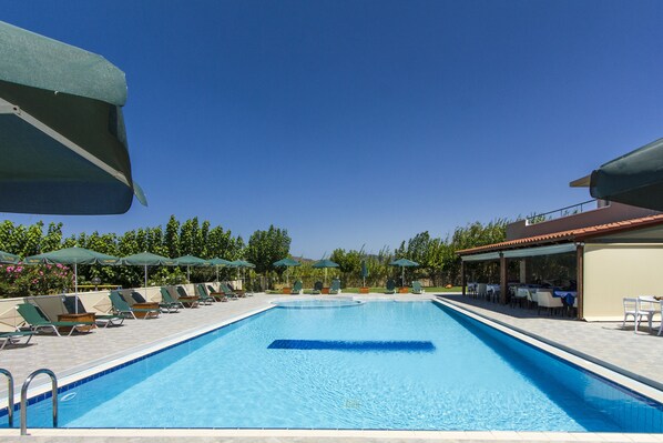 Outdoor pool, pool umbrellas, pool loungers