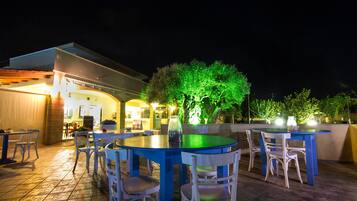 Breakfast, lunch, dinner served; local cuisine, pool views