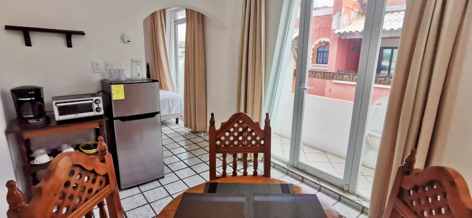 Suíte estúdio júnior, 2 camas de casal | Opções para refeição no quarto