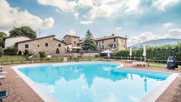 Outdoor pool, pool umbrellas, pool loungers