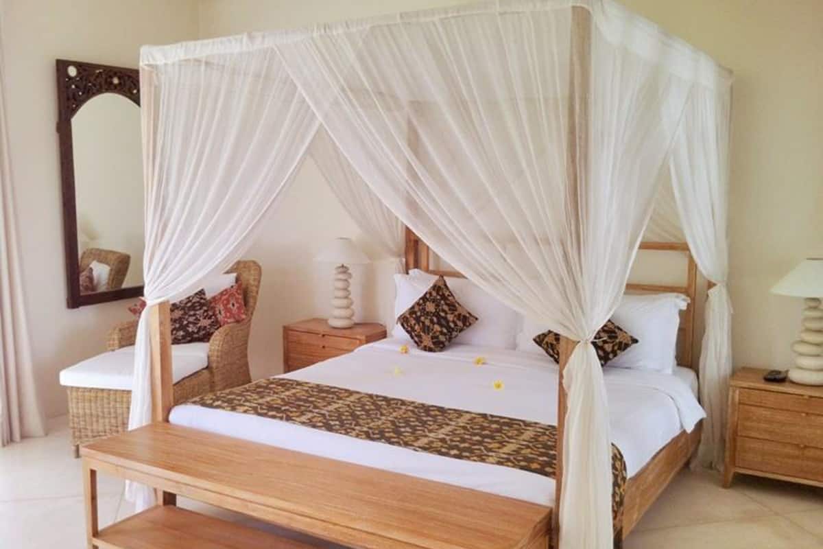 Premium bedding, down duvets, Select Comfort beds, in-room safe