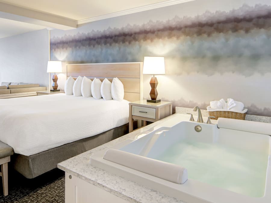 Individually decorated, desk, blackout drapes, iron/ironing board