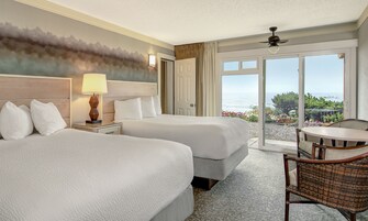 Individually decorated, desk, blackout drapes, iron/ironing board