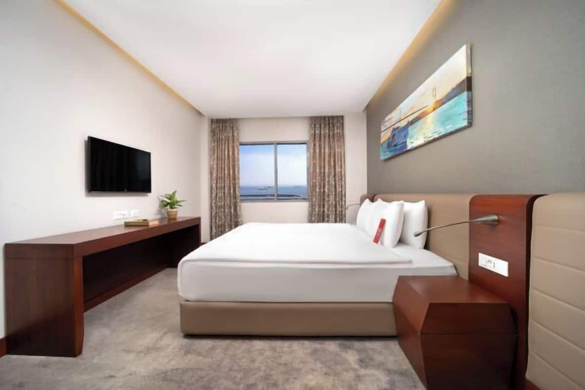 Roupas de cama premium, frigobar, cofres nos quartos