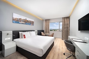 Ropa de cama de alta calidad y minibar 