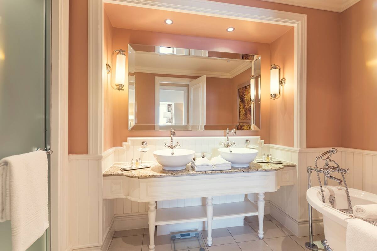 junior suite | bathroom | separate bathtub and shower, free toiletries, hair dryer, towels