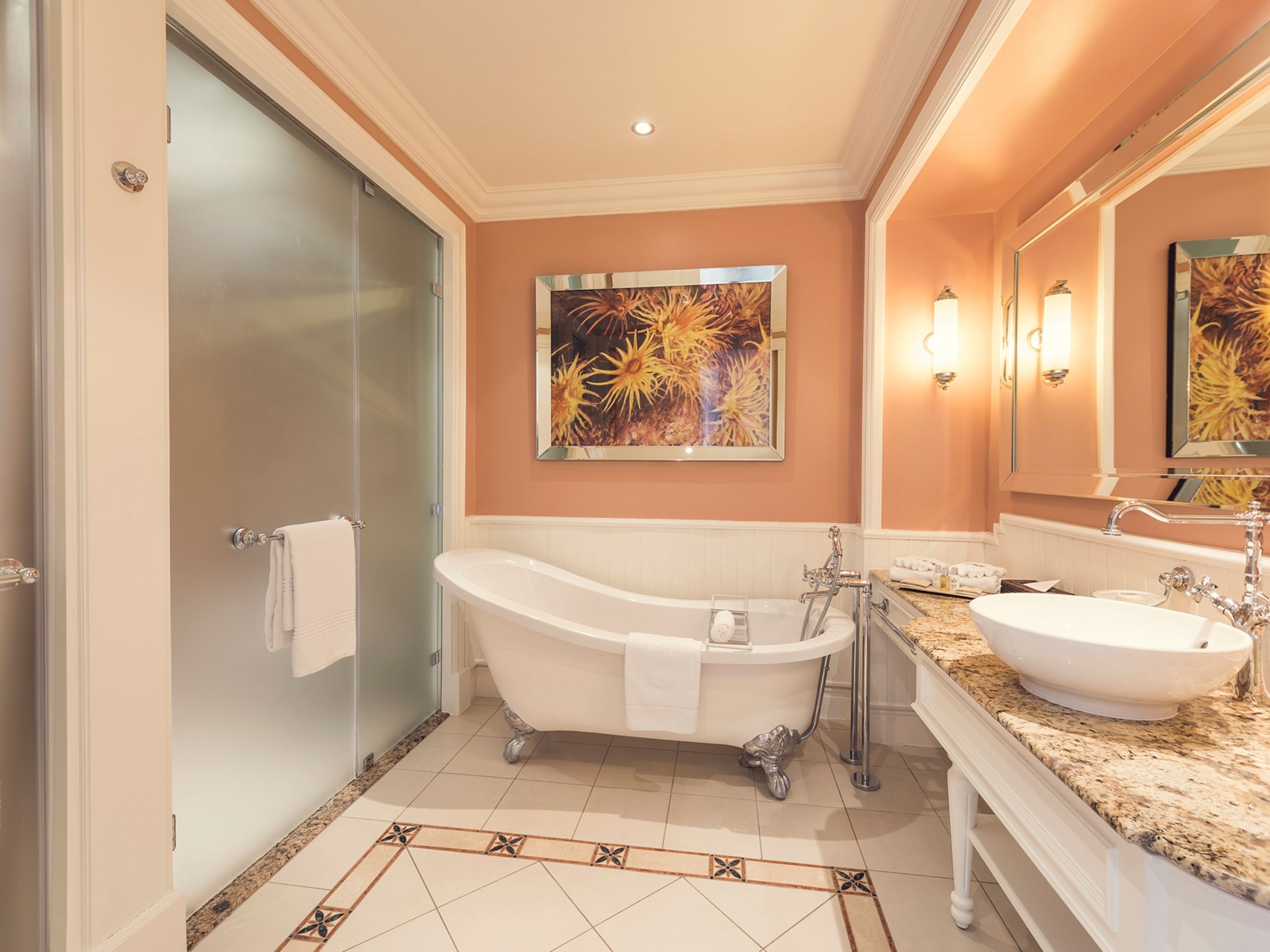 separate bathtub and shower, free toiletries, hair dryer, towels