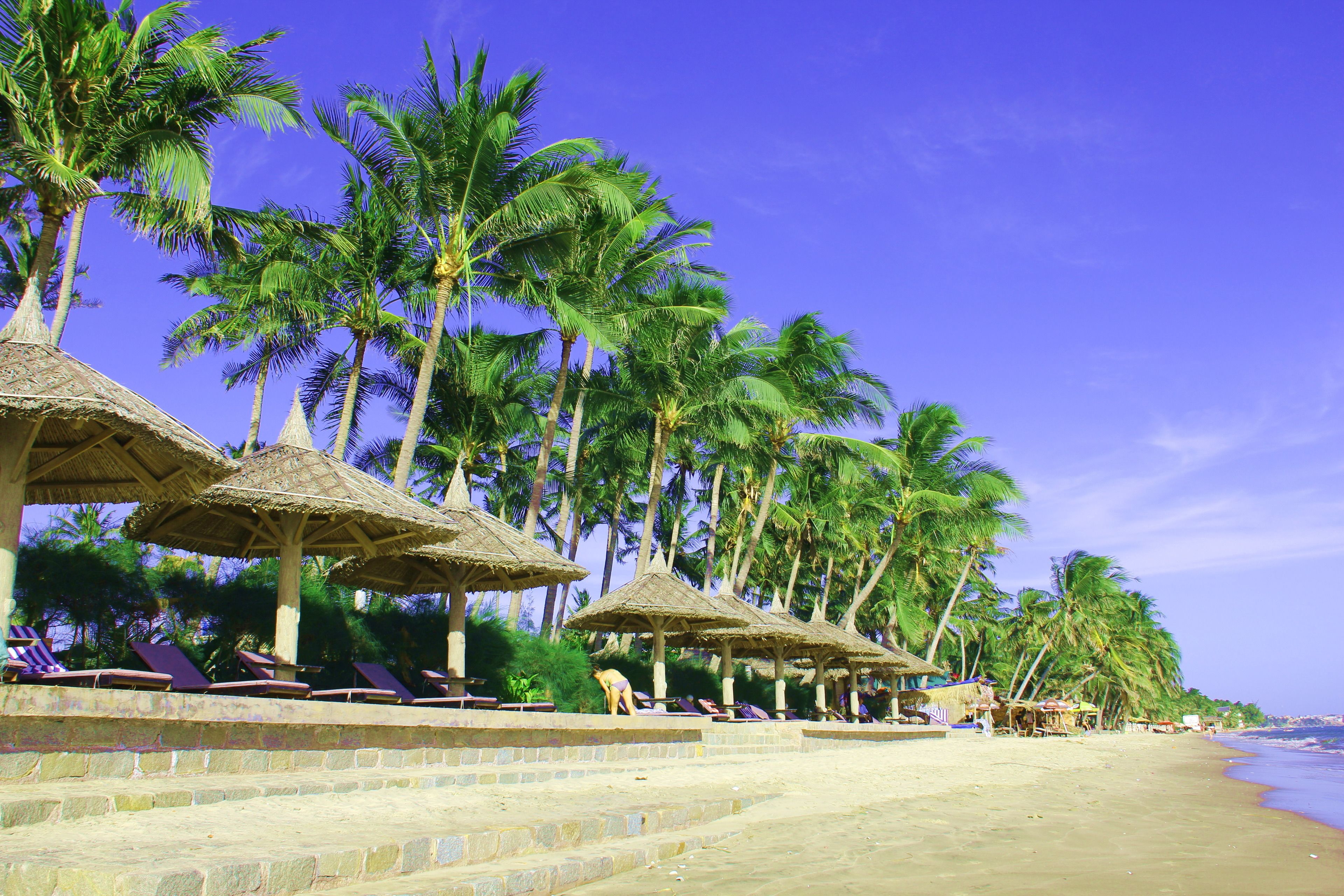 On the beach, sun-loungers, beach umbrellas