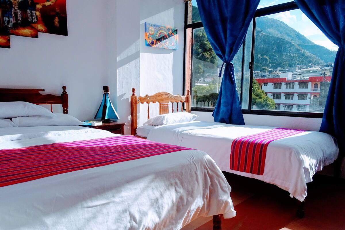 Triple Room, Mountain View | Down duvets, in-room safe, iron/ironing board, free WiFi