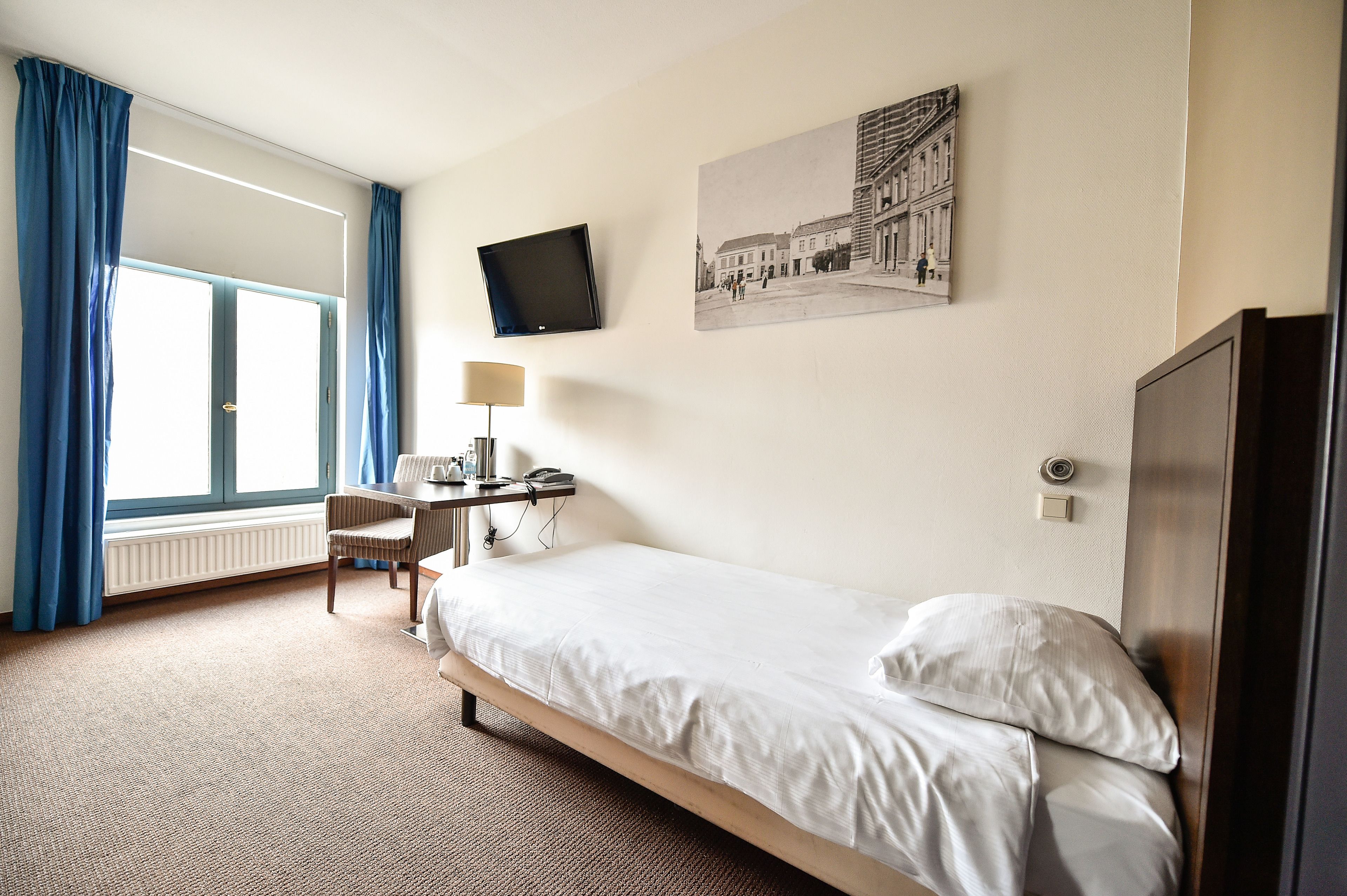 single room | in-room safe, desk, blackout curtains, free cots/infant beds