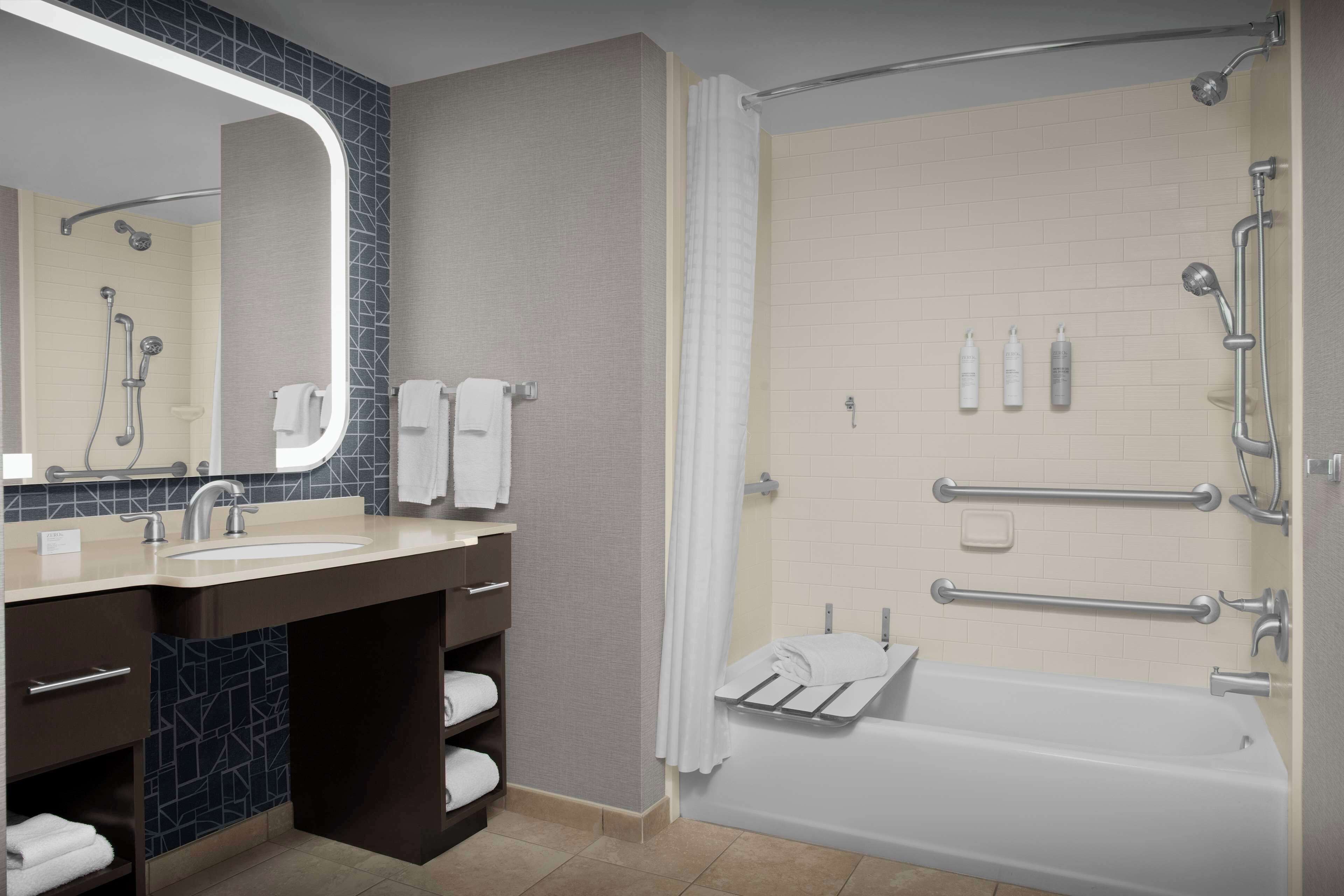 hydromassage showerhead, free toiletries, hair dryer, towels