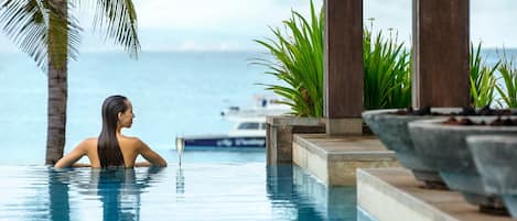 3 outdoor pools, open 6:00 AM to 7:00 PM, pool umbrellas, sun loungers