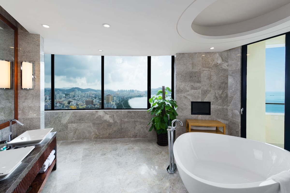 presidential suite, 1 king, ocean view, high floor, balcony | bathroom | separate bathtub and shower, rainfall showerhead, hair dryer, bathrobes