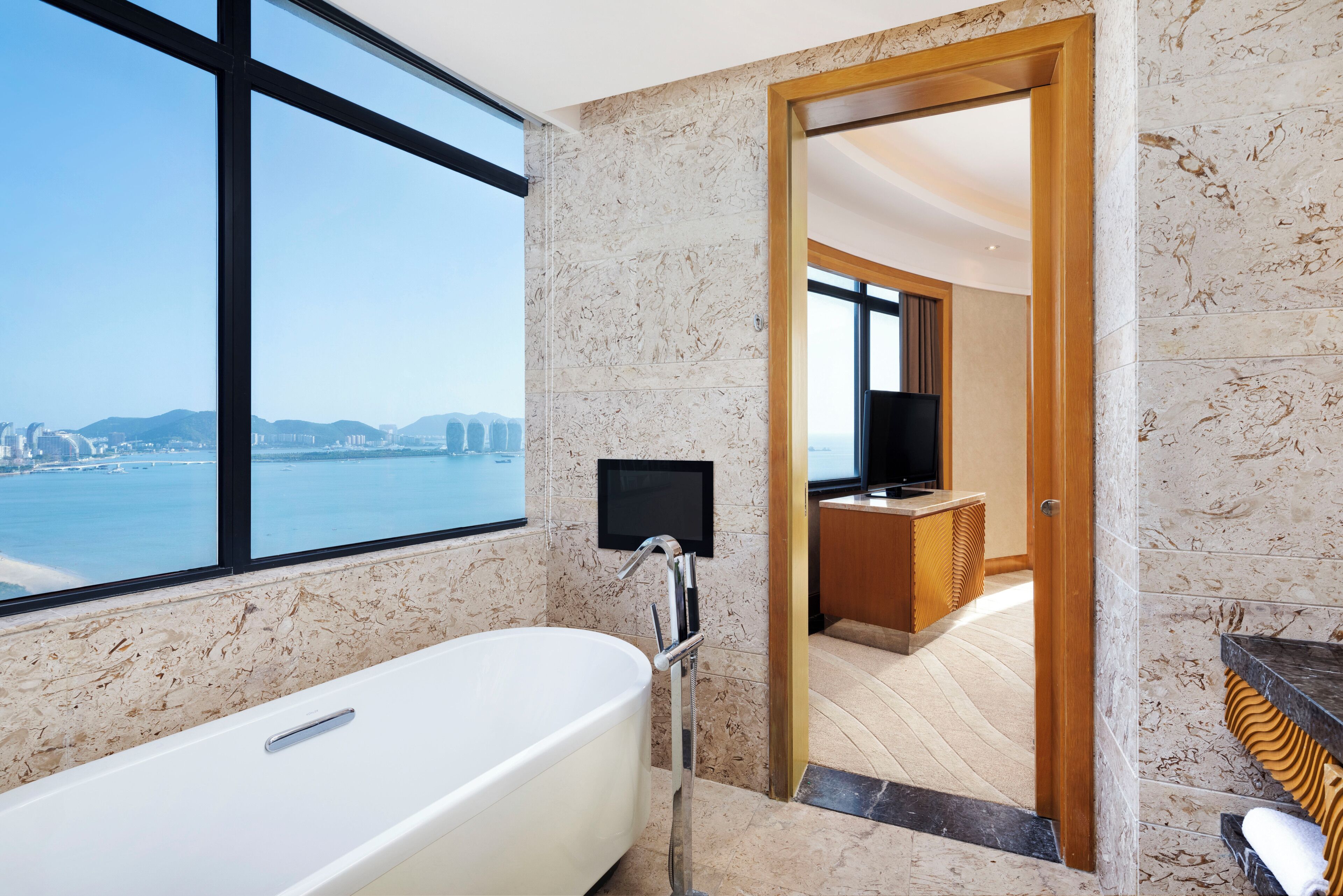 family ocean suite, 2 bedroom suite, bedroom 1: 1 king, bedroom 2: 2 doubles, ocean view | bathroom | separate bathtub and shower, rainfall showerhead, hair dryer, bathrobes