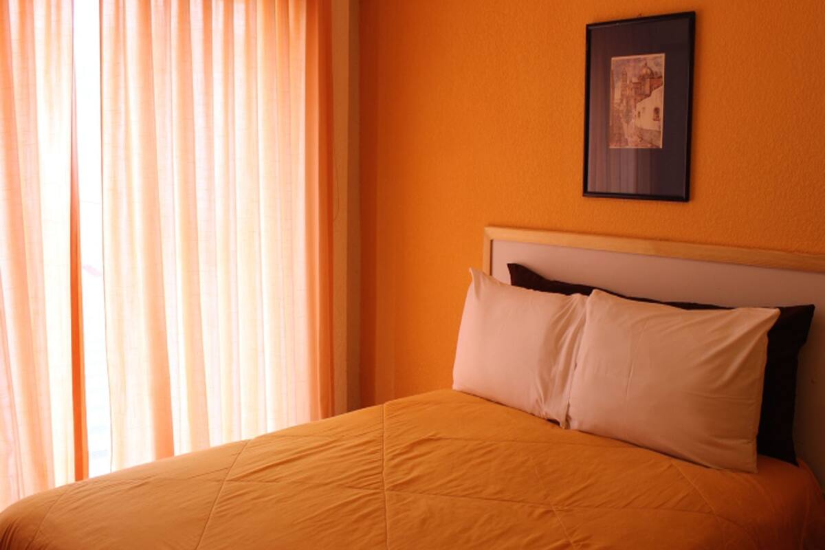 Blackout curtains, iron/ironing board, free WiFi, bed sheets