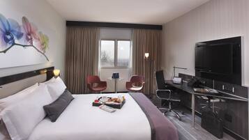 Down comforters, pillowtop beds, minibar, in-room safe