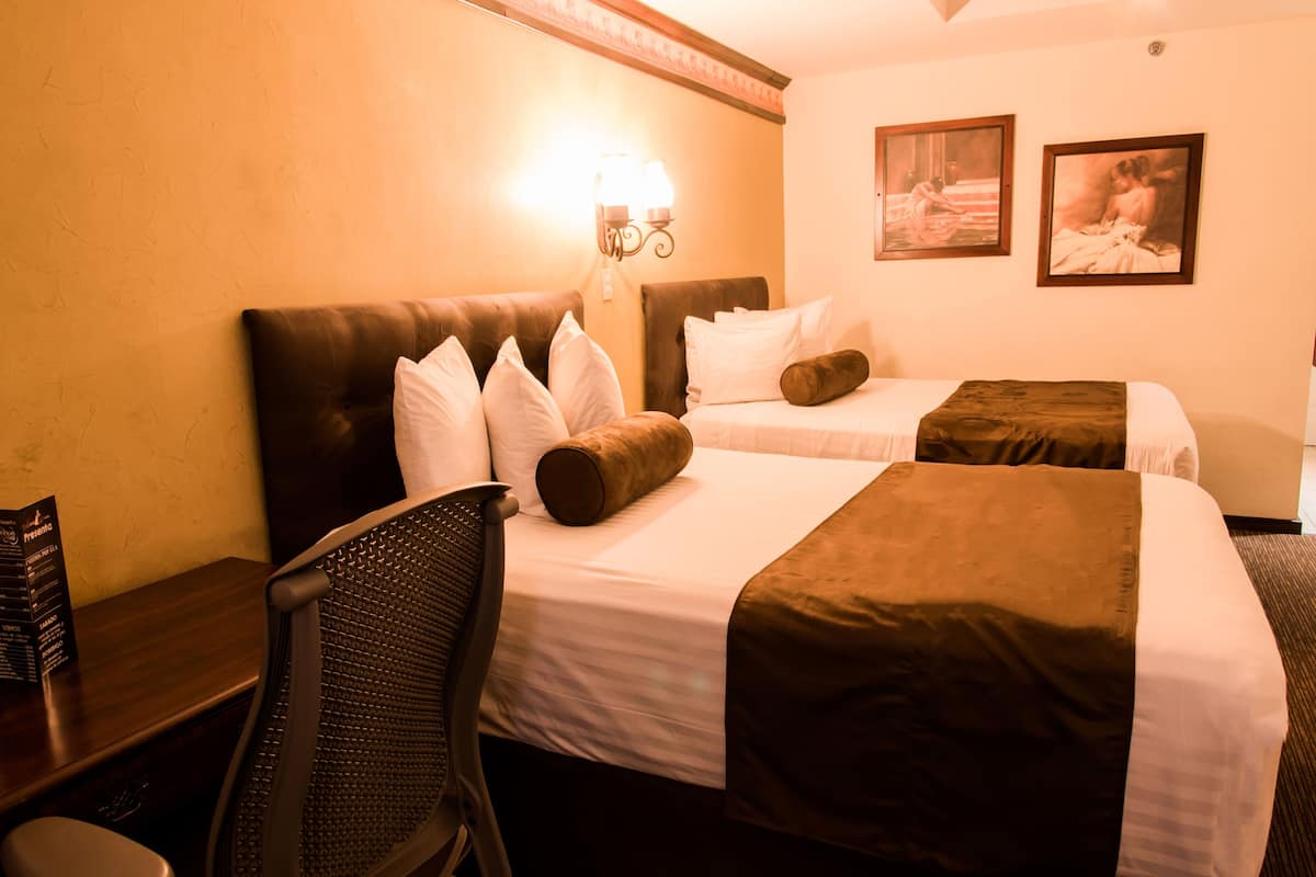 family room, 1 bedroom, refrigerator | premium bedding, down duvets, pillow-top beds, individually decorated