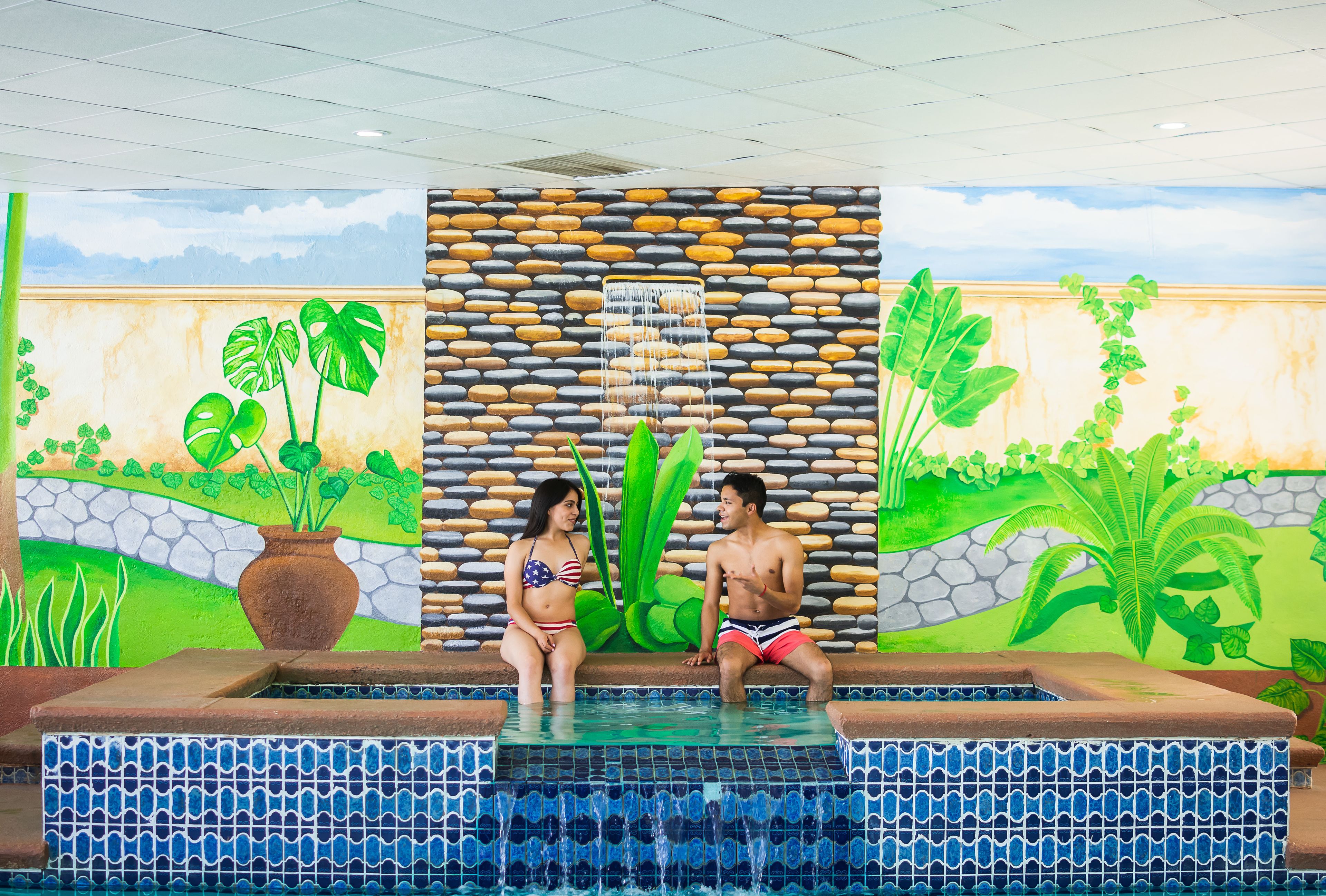 indoor pool, open 9:00 am to 9:00 pm, pool loungers