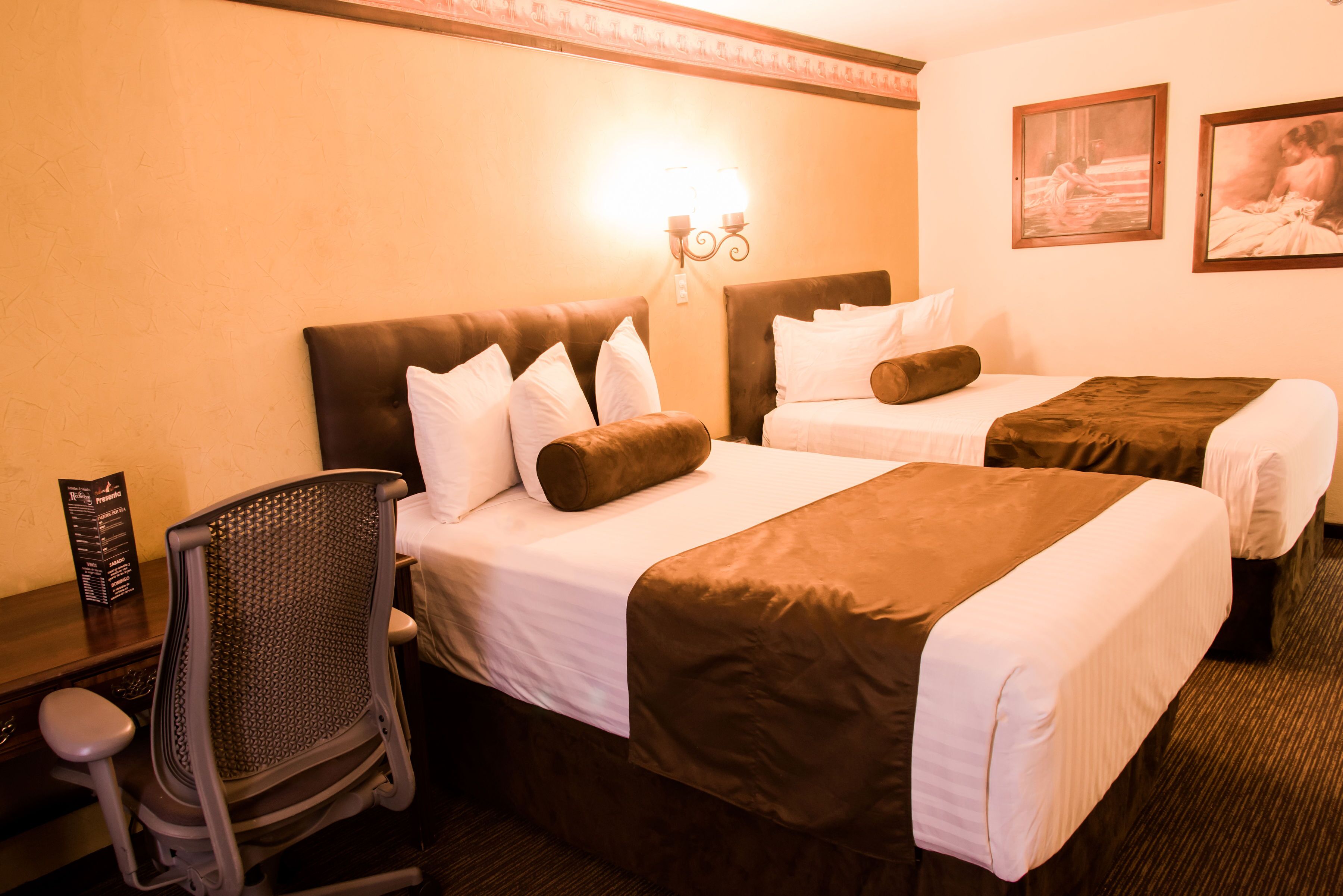 premium bedding, down duvets, pillow-top beds, individually decorated