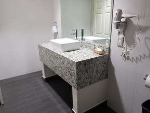Premium Suite, Multiple Beds | Bathroom | Shower, hair dryer, towels