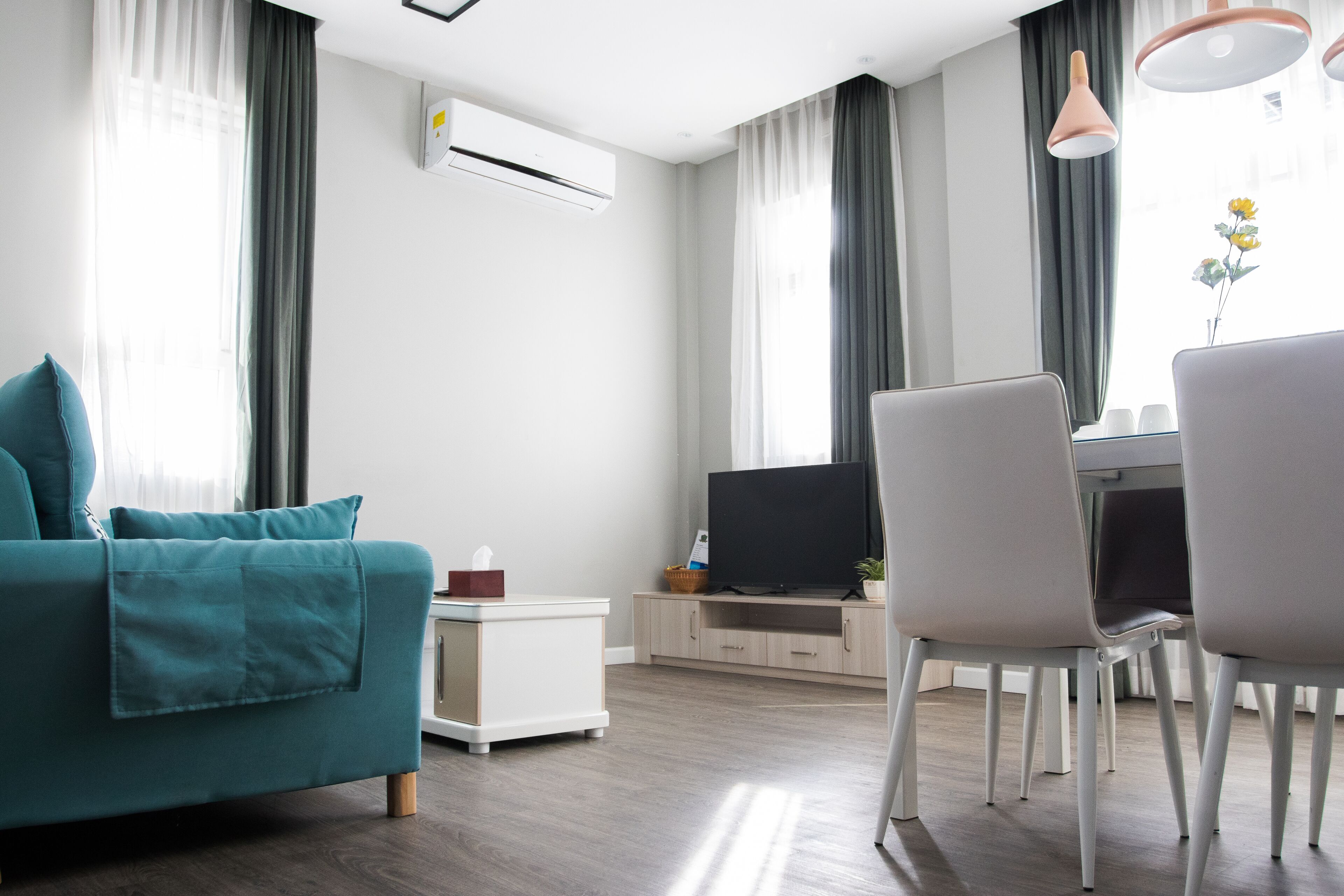 two bedroom apartment | living room | 32-inch led tv with cable channels, tv