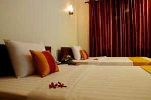 ห้องซูพีเรียทวิน, เตียงเดี่ยว 2 เตียง | เตียงพร้อมฟูกเสริมที่นอน, ตู้นิรภัยในห้องพัก