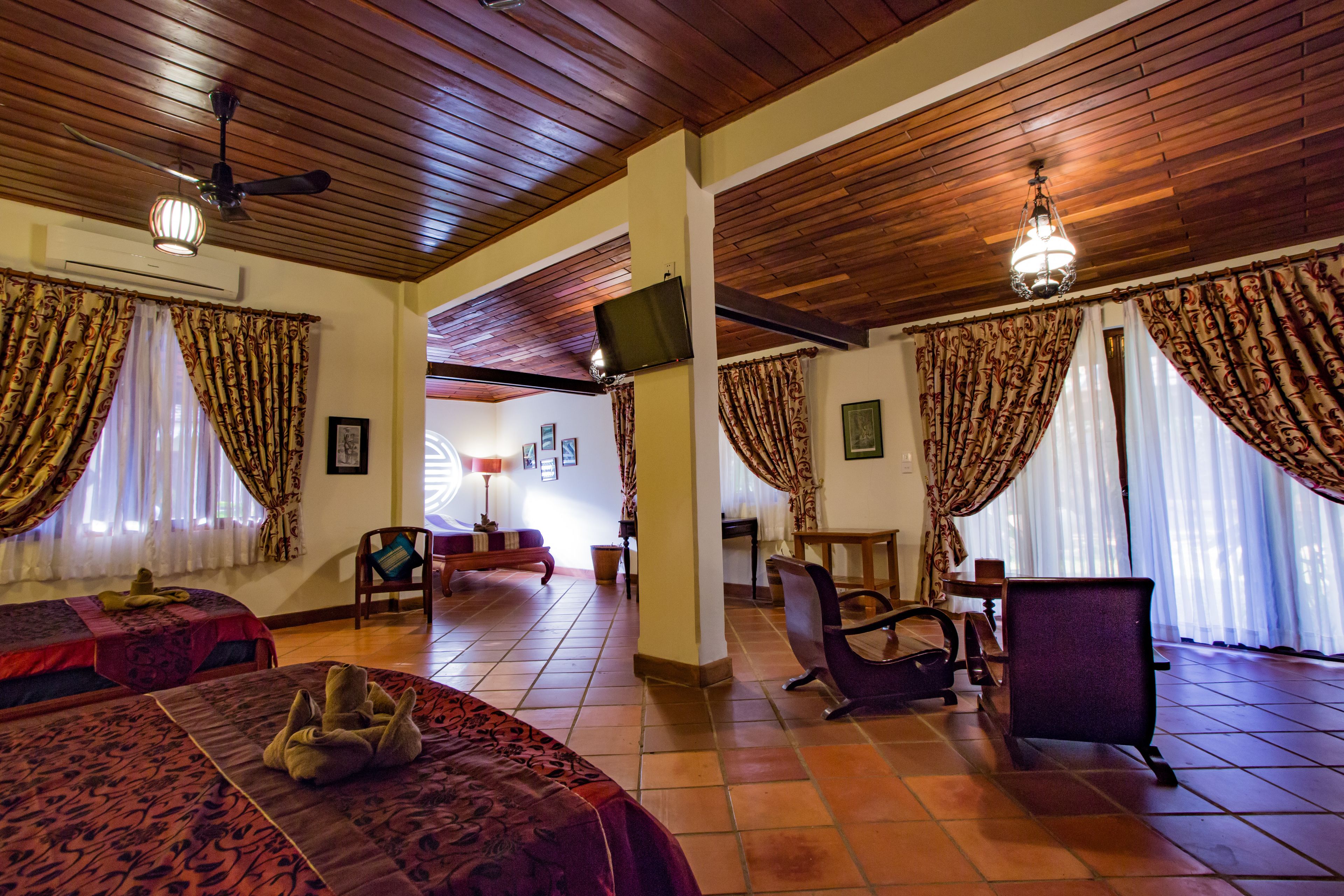 triple superior suite (ac & fan) | premium bedding, in-room safe, desk, blackout curtains