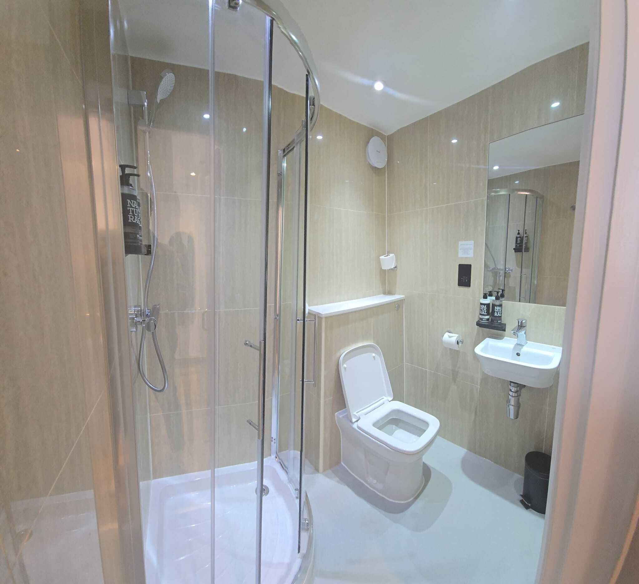 Shower, eco-friendly toiletries, hair dryer, towels