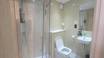 Shower, eco-friendly toiletries, hair dryer, towels