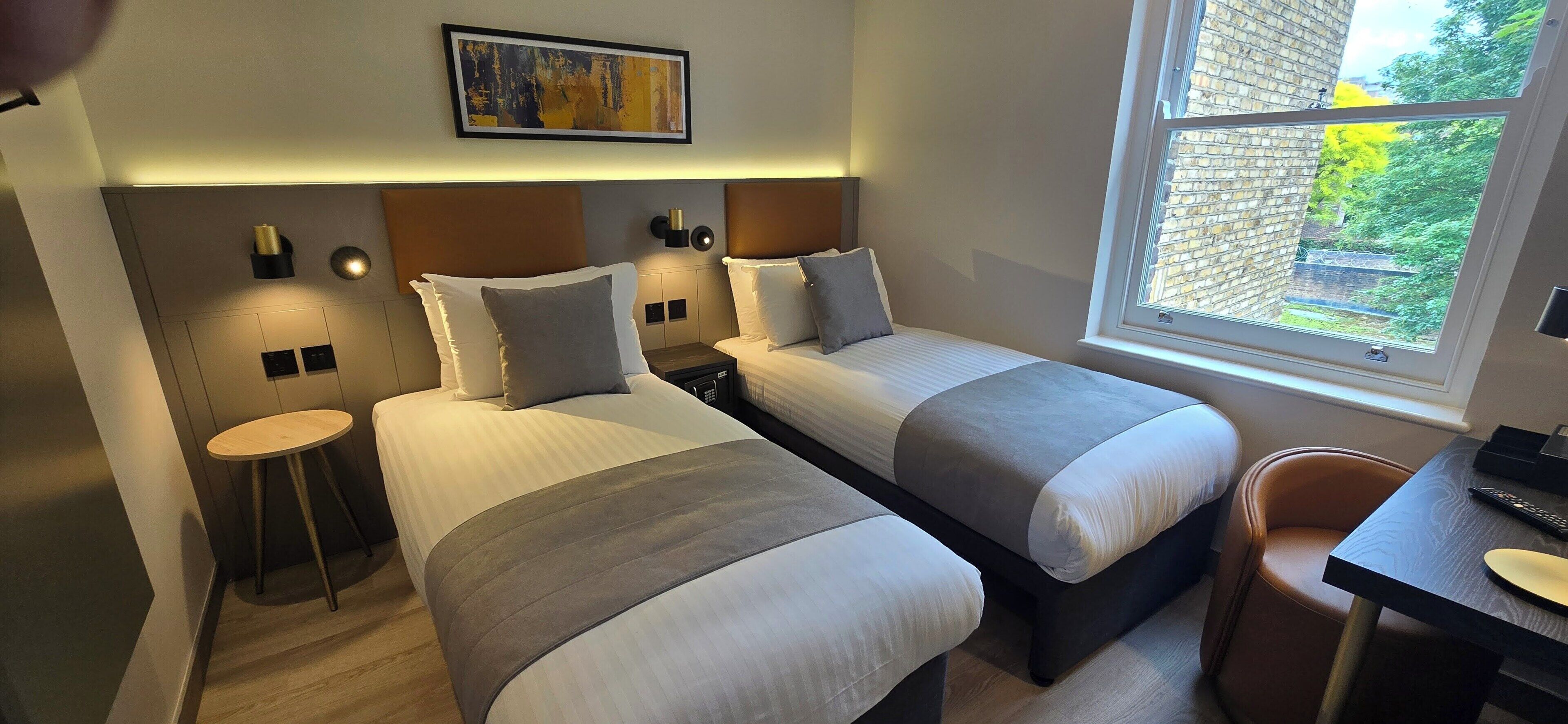 Standard Twin Room | In-room safe, desk, laptop workspace, blackout drapes