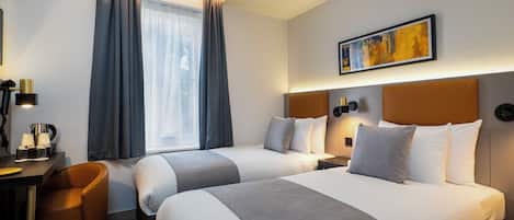 Standard Twin Room | In-room safe, desk, laptop workspace, blackout drapes