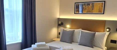 Standard Double Room | In-room safe, desk, laptop workspace, blackout drapes