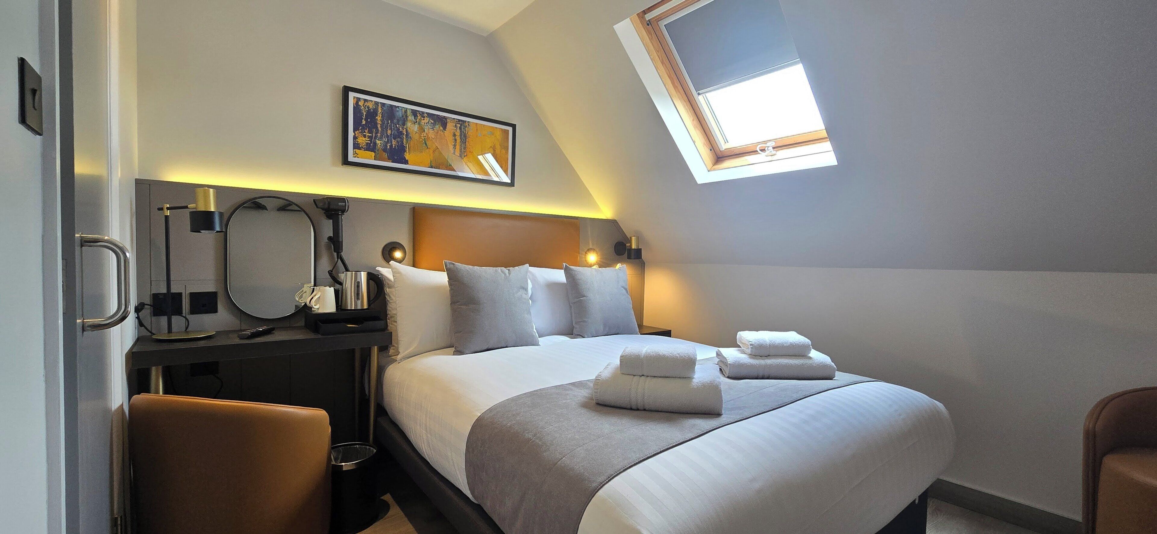 Compact Double | In-room safe, desk, laptop workspace, blackout drapes