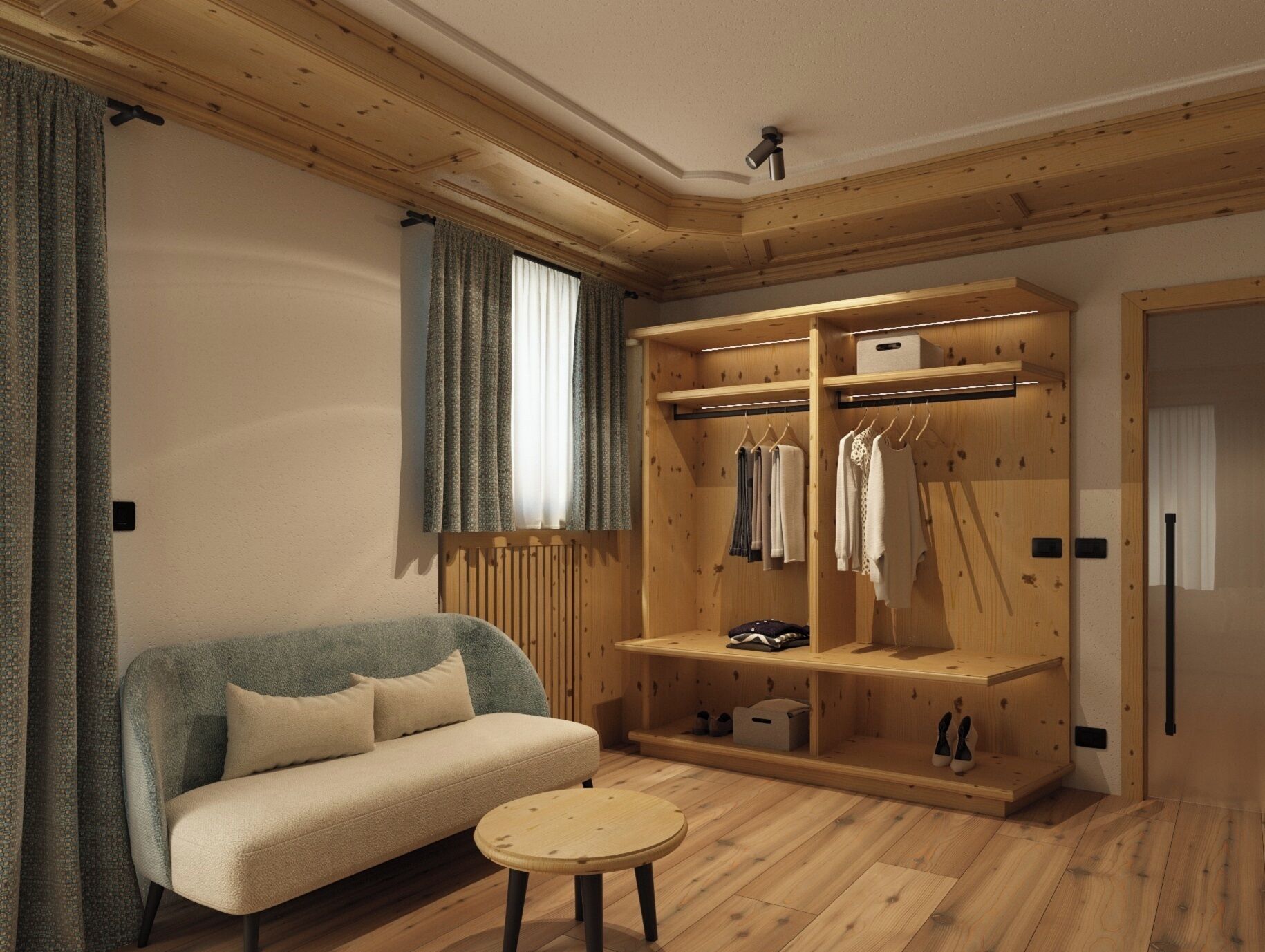 A cozy room with a wooden wardrobe, a sofa, and a small round table.
