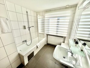 Comfort Triple Room, 1 Bedroom, Non Smoking, Mountain View | Bathroom | Hair dryer, bathrobes, towels - Haus Schrofenstein (Lech am Arlberg)