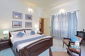 Desk, blackout curtains, iron/ironing board, rollaway beds
