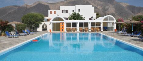 Outdoor pool, pool umbrellas, pool loungers