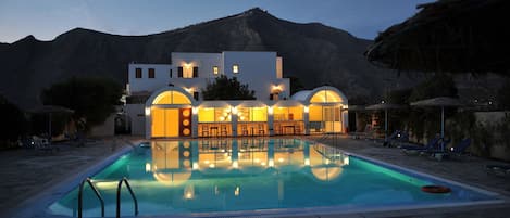 Outdoor pool, pool umbrellas, pool loungers