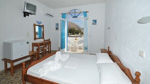 Tabla de planchar con plancha, cunas, wifi gratis y ropa de cama