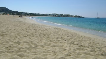 Beach nearby, white sand, 3 beach bars