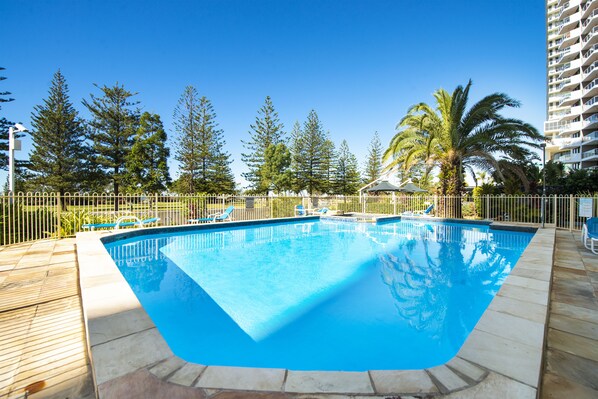 Outdoor pool, pool umbrellas, pool loungers