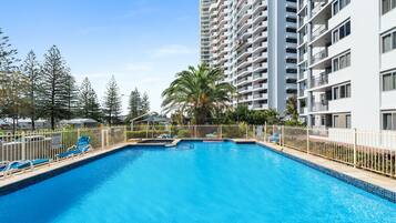 Outdoor pool, pool umbrellas, sun loungers