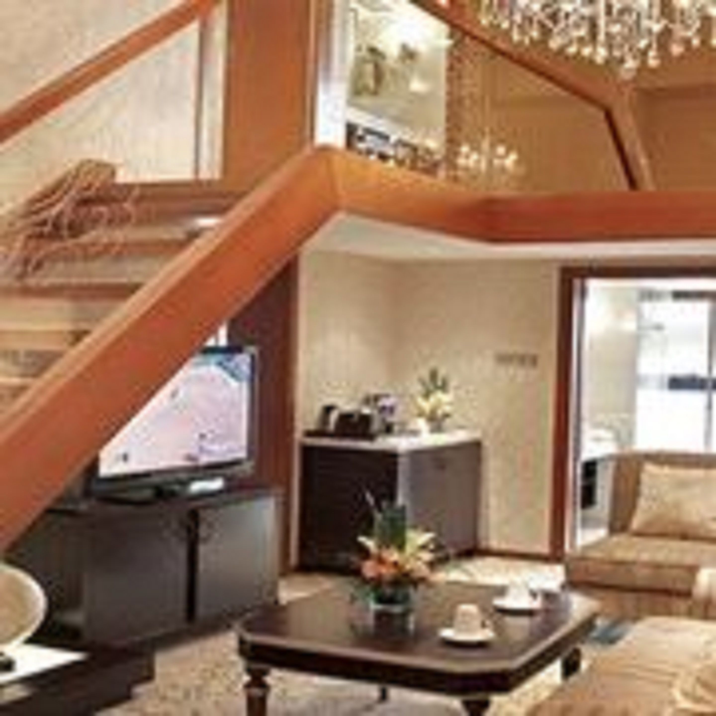 deluxe suite, 2 king bed, non smoking | living area | flat-screen tv, dvd player