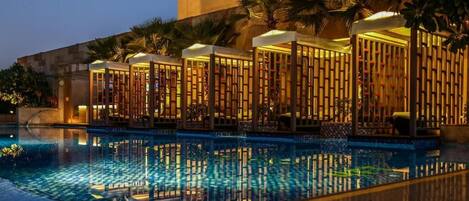 Outdoor pool, open 7:00 AM to 8:00 PM, pool umbrellas, pool loungers