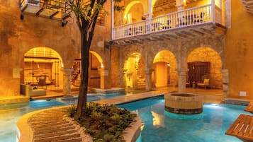 Outdoor pool, pool umbrellas, sun loungers