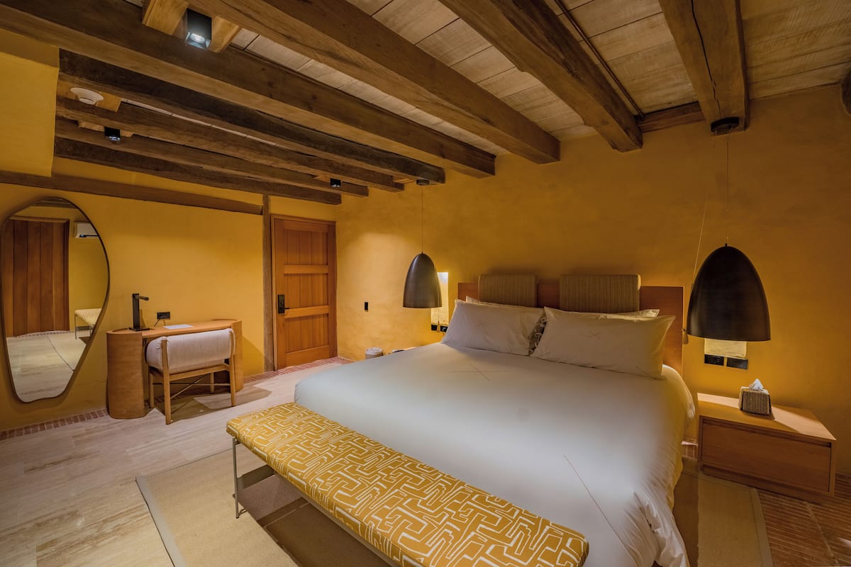 Quarto superior | 1 quarto, roupas de cama premium, edredons de pluma